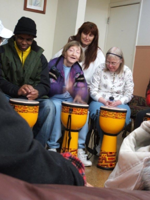 Clients playing music together - Magnolia Community Services